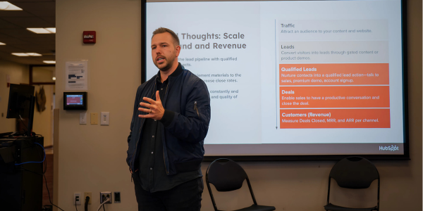 Kyle Denhoff speaking to marketing students at his alma mater, St. John Fisher